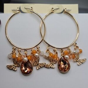 Gold Tone Orange Bead Hoop Earrings With Butterflies